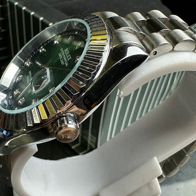 Rolex green date dial