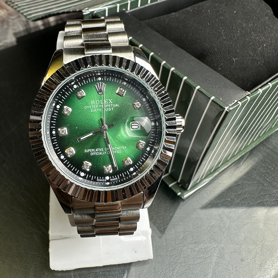 Rolex green date dial