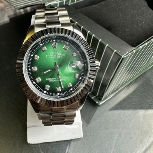 Rolex green date dial